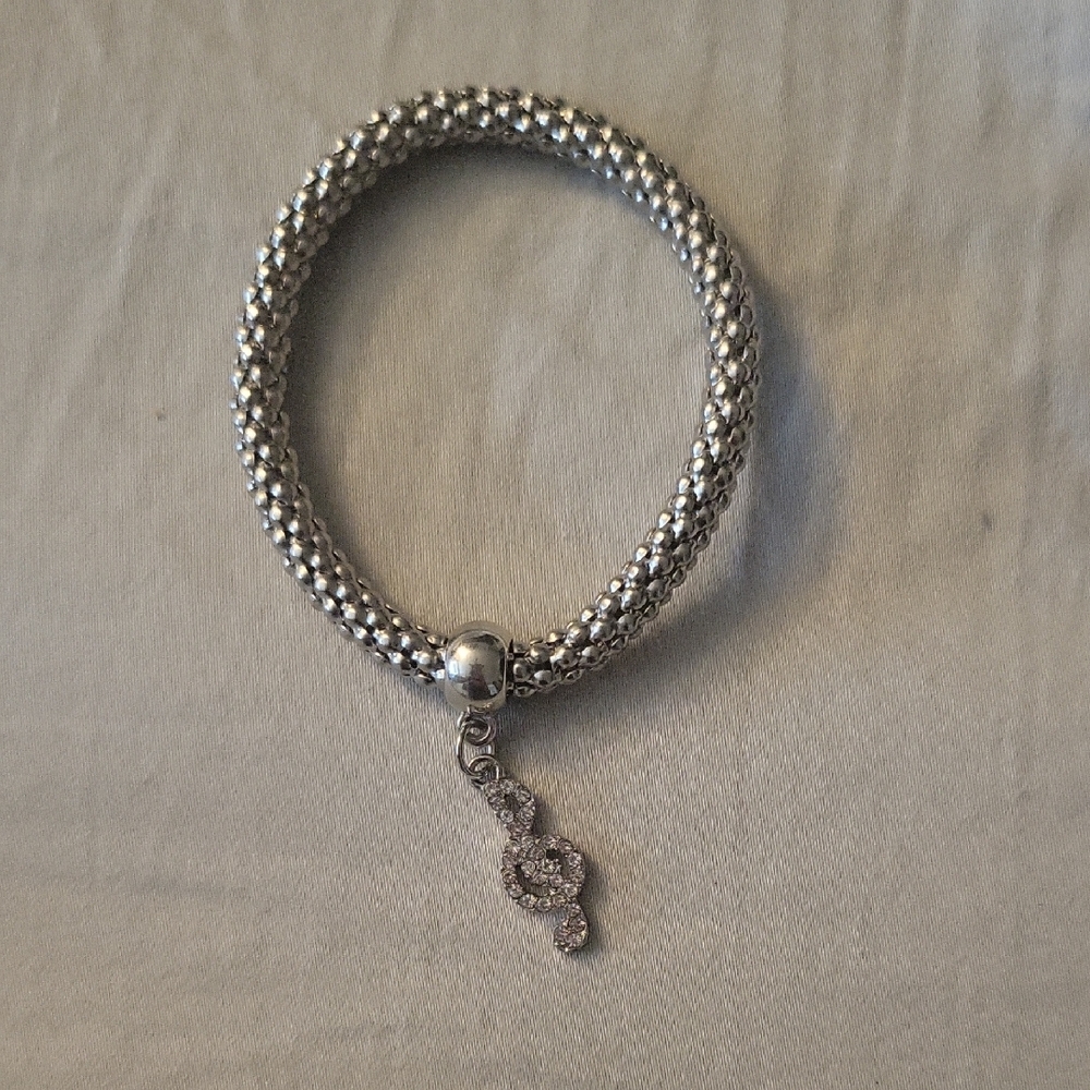 Elegant Silver Bracelet with Charm